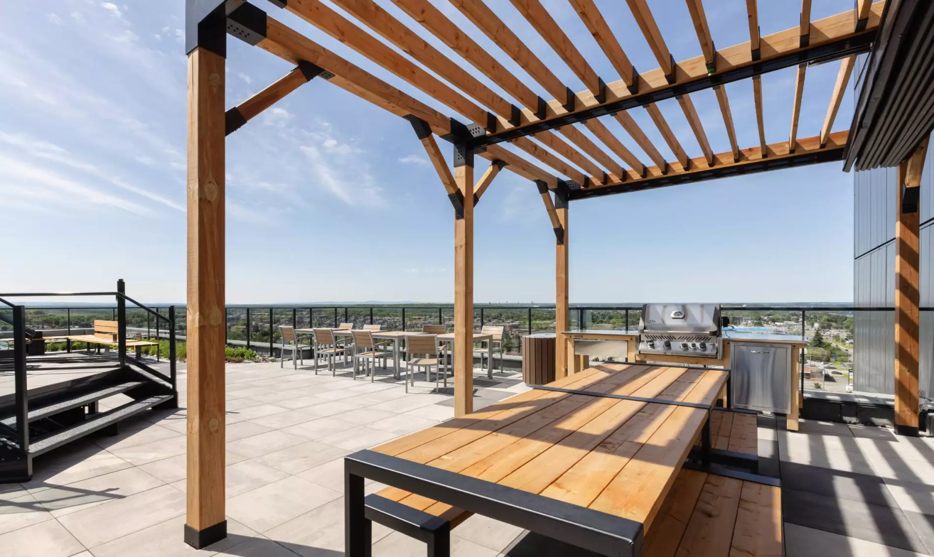Espace BBQ Terrasse sur le toit District GC